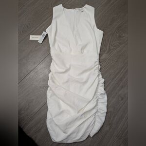 New sexy white viva dress by Babaton  size 0 perfect condition